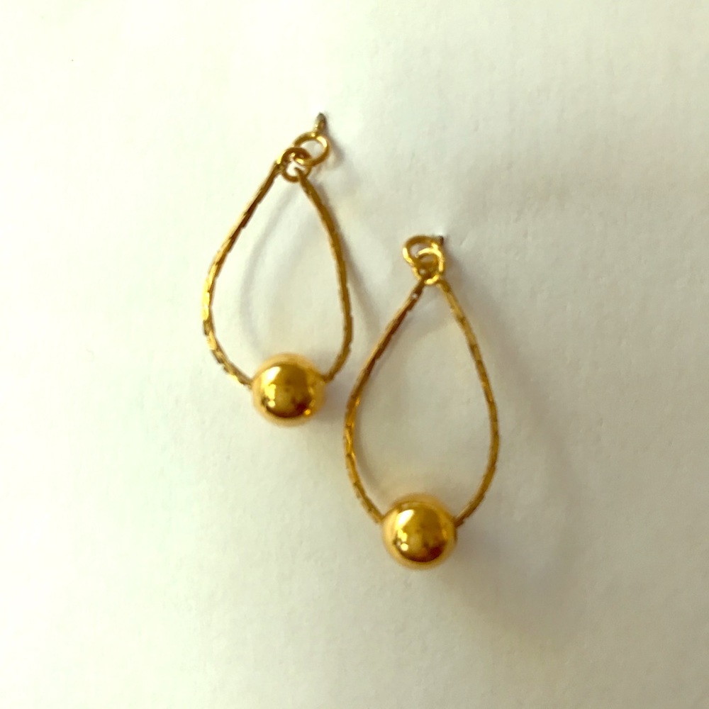 Gold chain-and-ball earrings for pierced ears